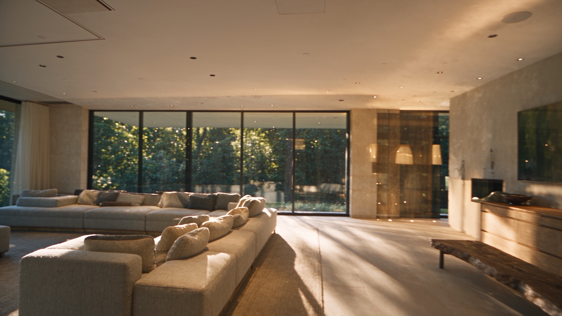 A bright living room with oak, stone and garden glazing
