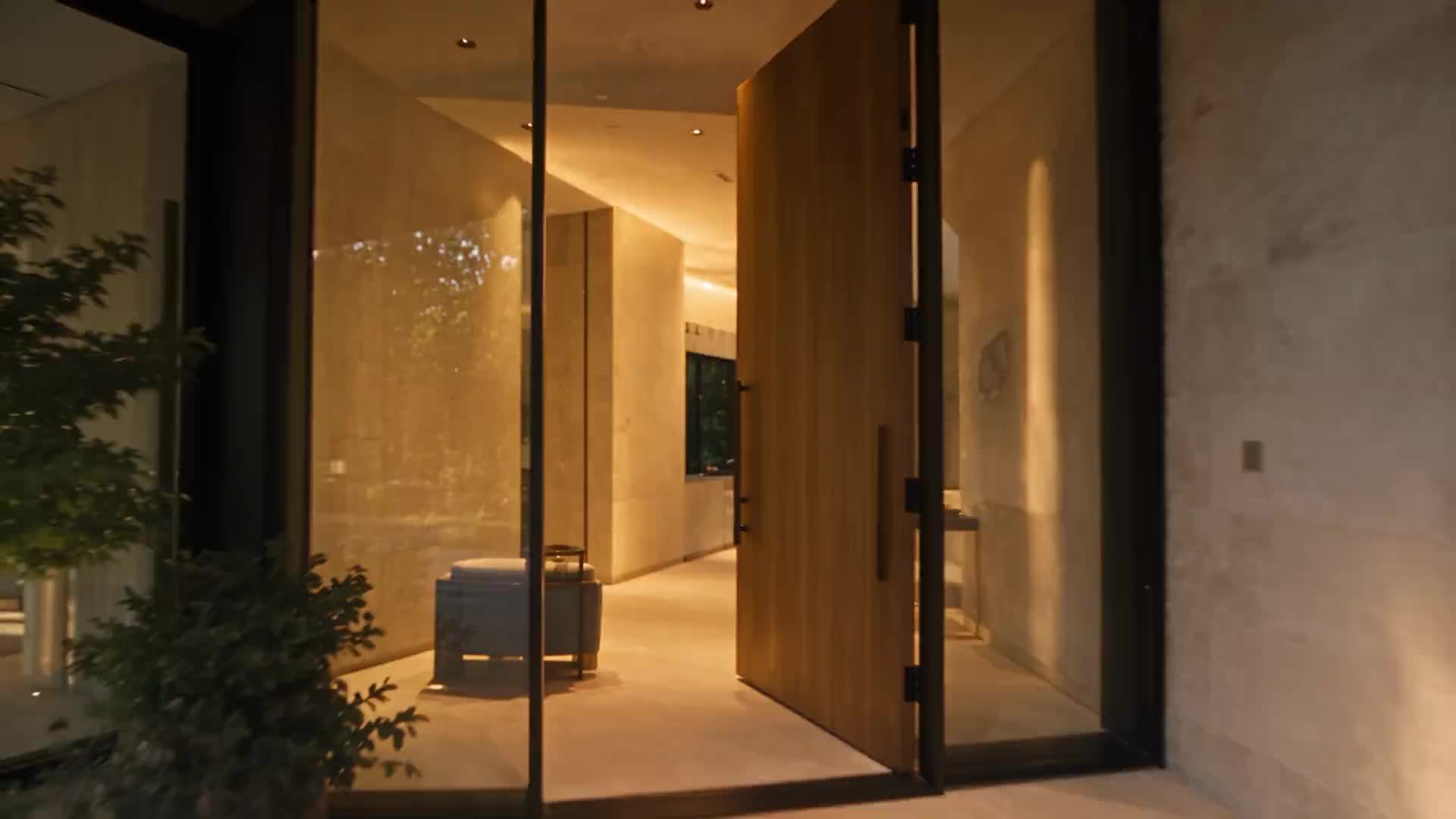 The oak entrance opens to the warm interior